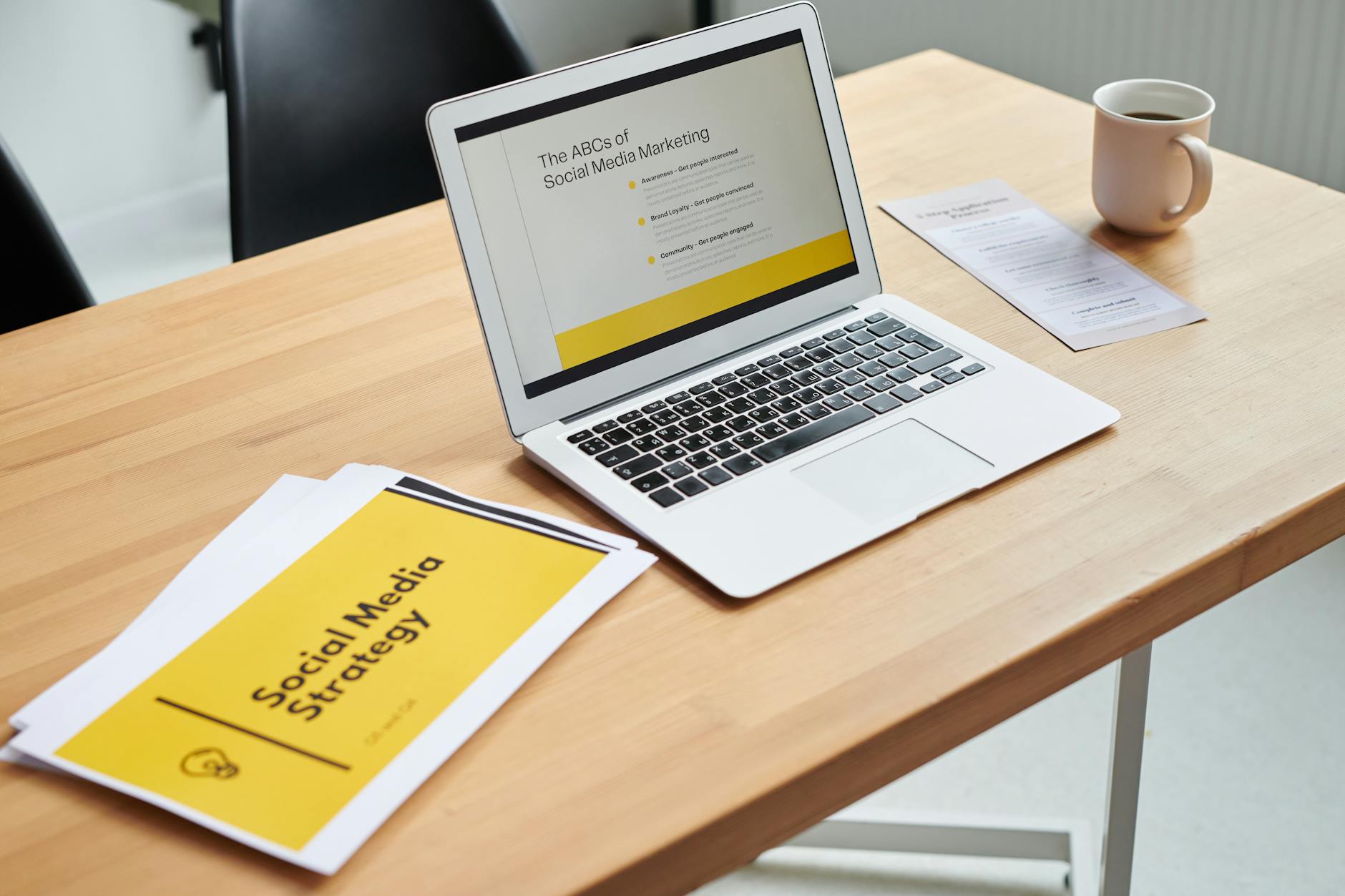 Laptop displaying paid media strategy dashboard for Australian small business advertising campaigns