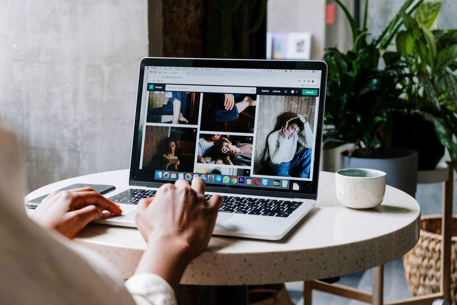 Small business owner checking website performance metrics on laptop to improve Core Web Vitals